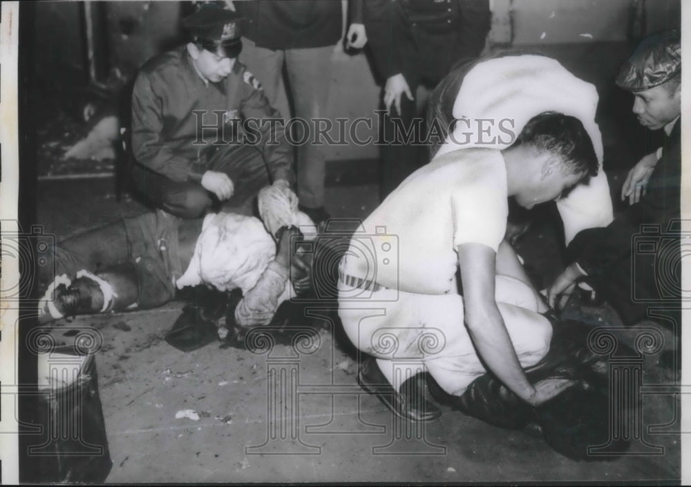 1960 Rescue Works Tend to Passengers Injured From Bomb on NY Subway - Historic Images