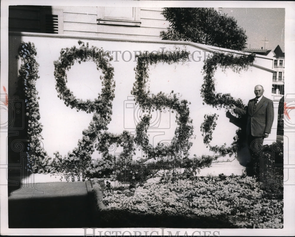 1955 Anton Zitner With Rose Display on Wall For the Year - Historic Images