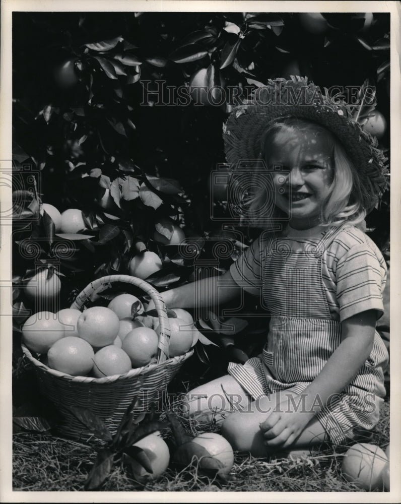 1956 Sissy MacCalla happy that drought ended in Cypress Gardens, FL - Historic Images