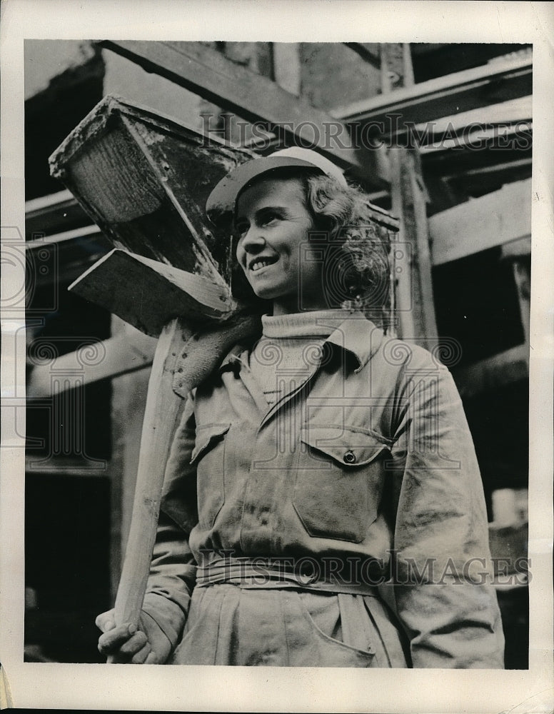 1940 Finnish Girl carrying a hod on a Helsinki building project - Historic Images