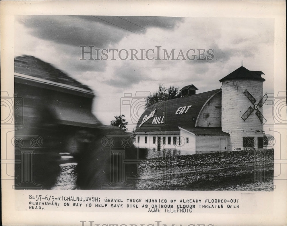 1948 Gravel Truck hurries by already flooded restaurant at Wash. - Historic Images