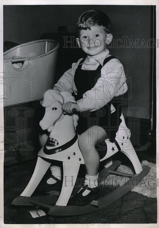 1950 Birmingham, England Terry Neale & new rocking horse - Historic Images