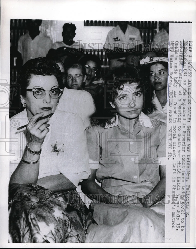 1957 Press Photo Riverside, Calif. German war bride Mrs F Nicholson at court - Historic Images