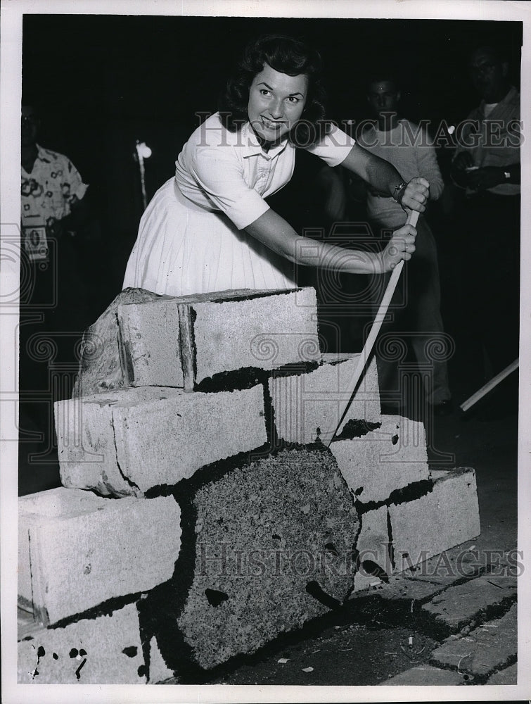 Dee Darnish shows Strength of Material.-Historic Images