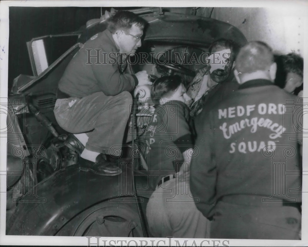 1956 Press Photo Rescuers over a Wrecked Truck.-Historic Images