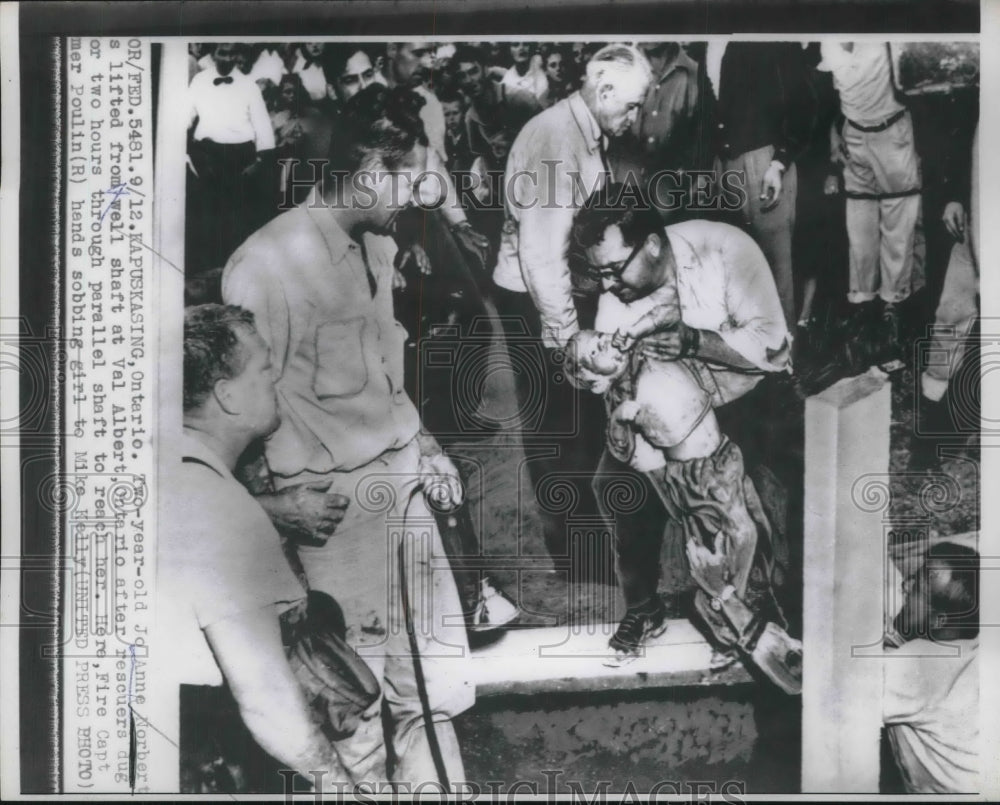 1957 Press Photo Kapuskasing,Canada Jo Anne Norbert rescued from a well-Historic Images