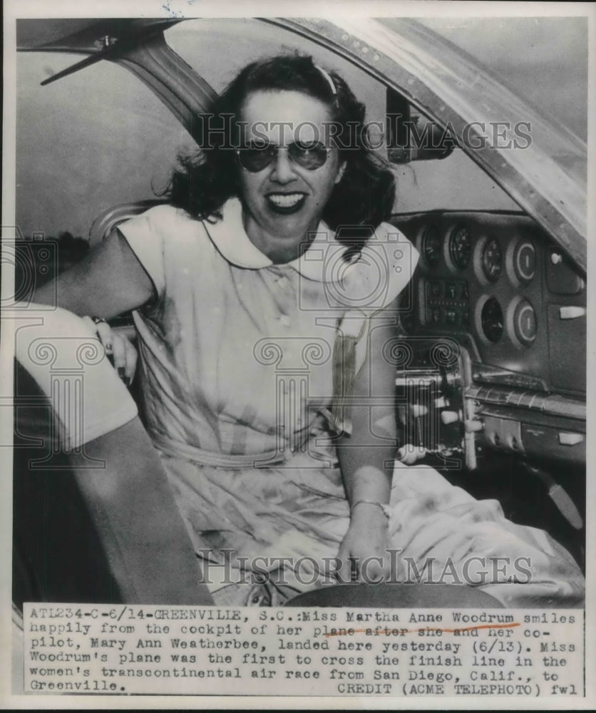 1954 Martha Anne Woodrum smiling from the cockpit of her plane after-Historic Images