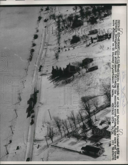 1960 Hundreds of cars & trucks stranded on the highway throughout-Historic Images