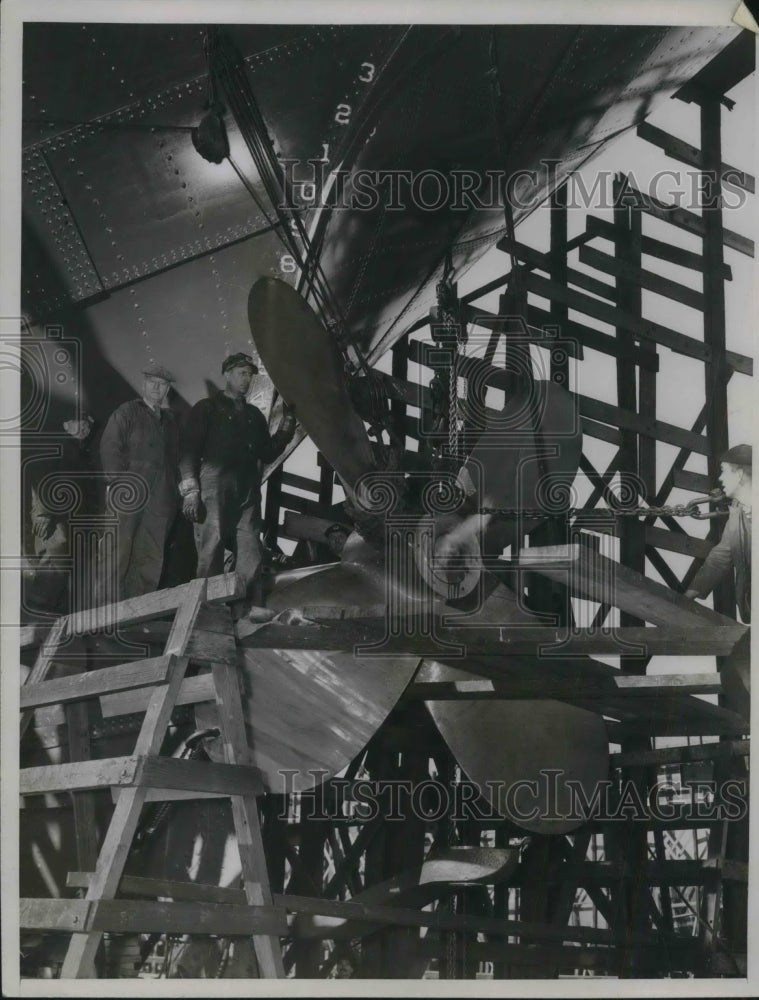 1937 Workers heating the hub of the propeller to be placed in the-Historic Images