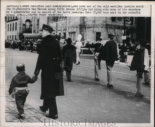 1952 lost boy gets help from cop during St. Patrick's Day parade, NY - Historic Images