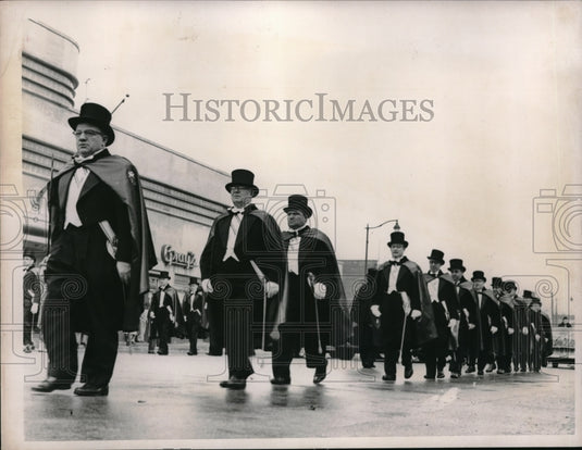 1956 Knights of Columbus members in St. Patrick's Day parade - Historic Images