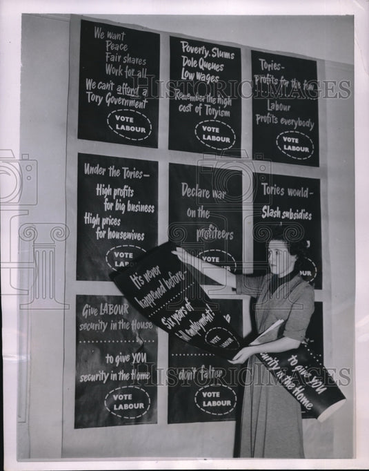 1951 Press Photo London, Miss Joyce Worley & election posters - Historic Images