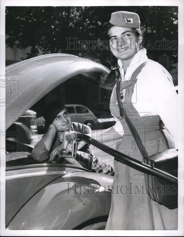 1956 Autoist Gazes Admiringly At Pretty Attendant Fueling His Car - Historic Images