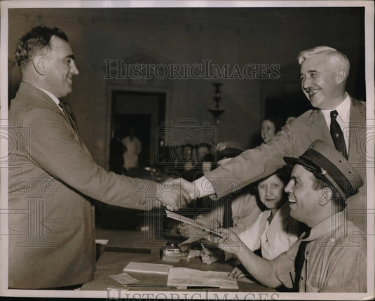1936 Press Photo John Ansalone, George C. Fell, director of Claim Service-Historic Images