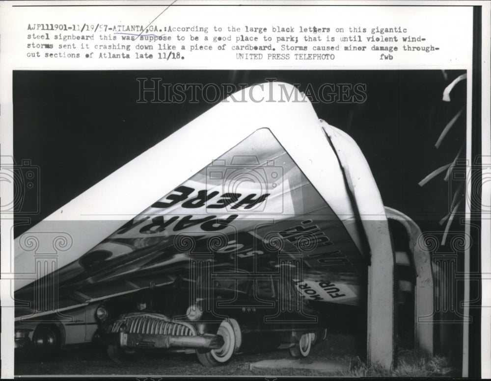 1957 Press Photo high winds blow over large parking sign, Atlanta, GA - Historic Images