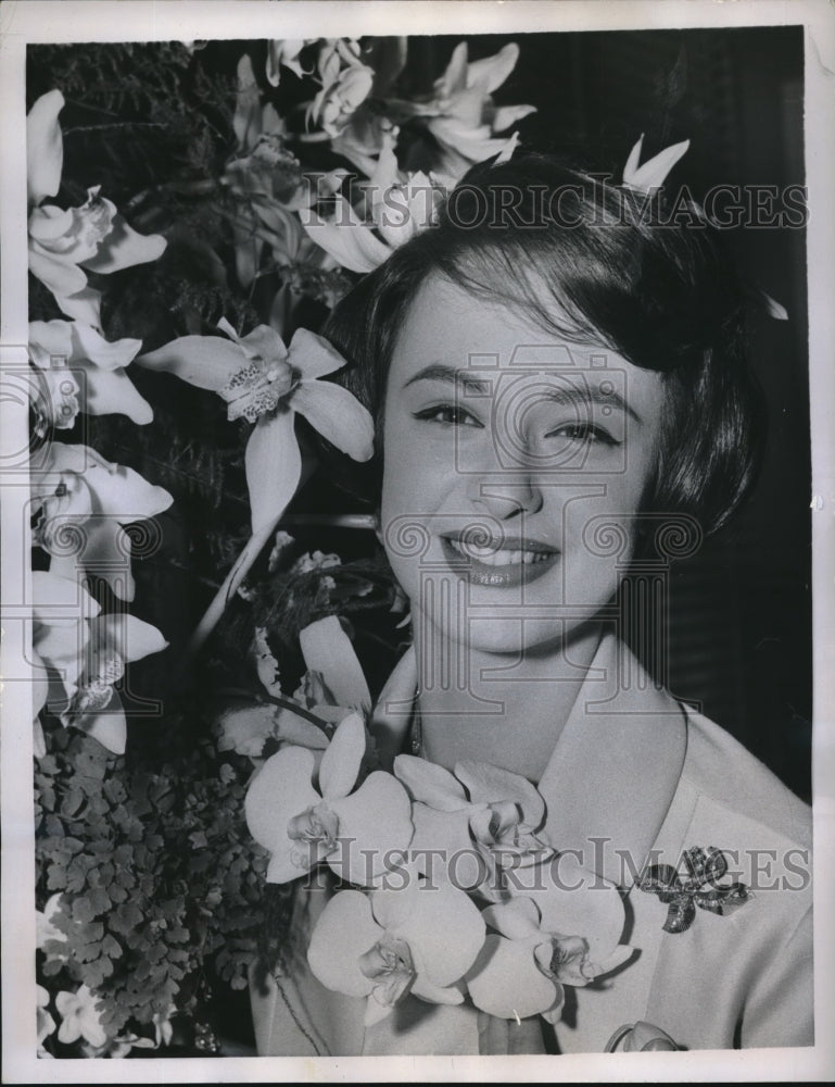 1958 Press Photo Francine Berger &amp; an orchid at Paris France show - neb65499 - Historic Images