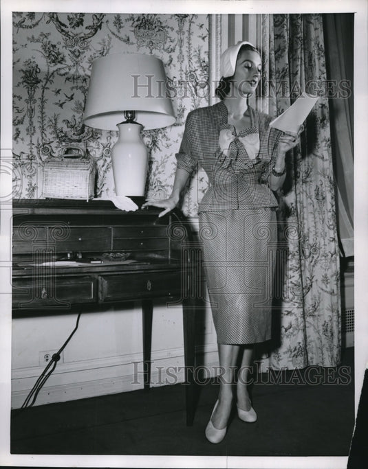 1951 A woman & her desk in living room of a home-Historic Images