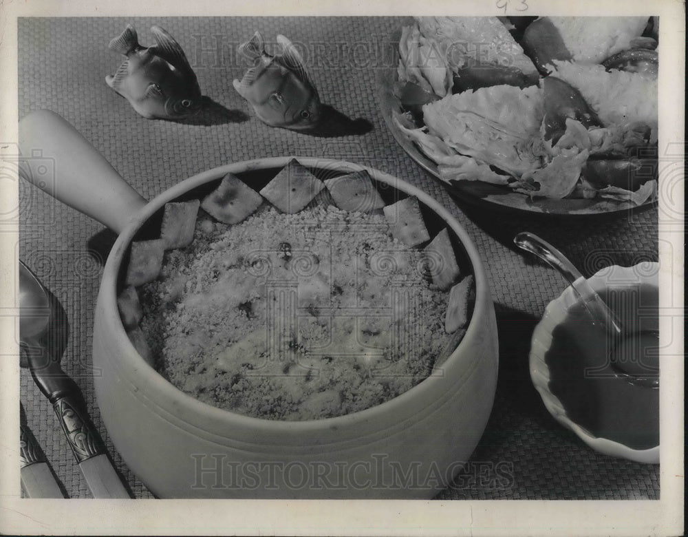 1950 Hearty Fish Casserole with Square Cheese Crackers - Historic Images