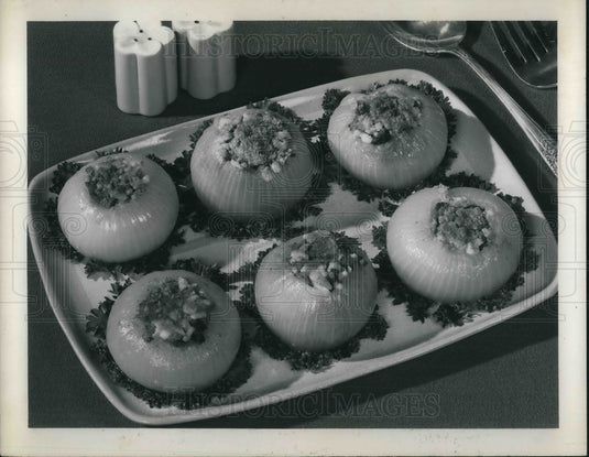 1950 Big onions stuffed with meat &oats served for dinner - Historic Images