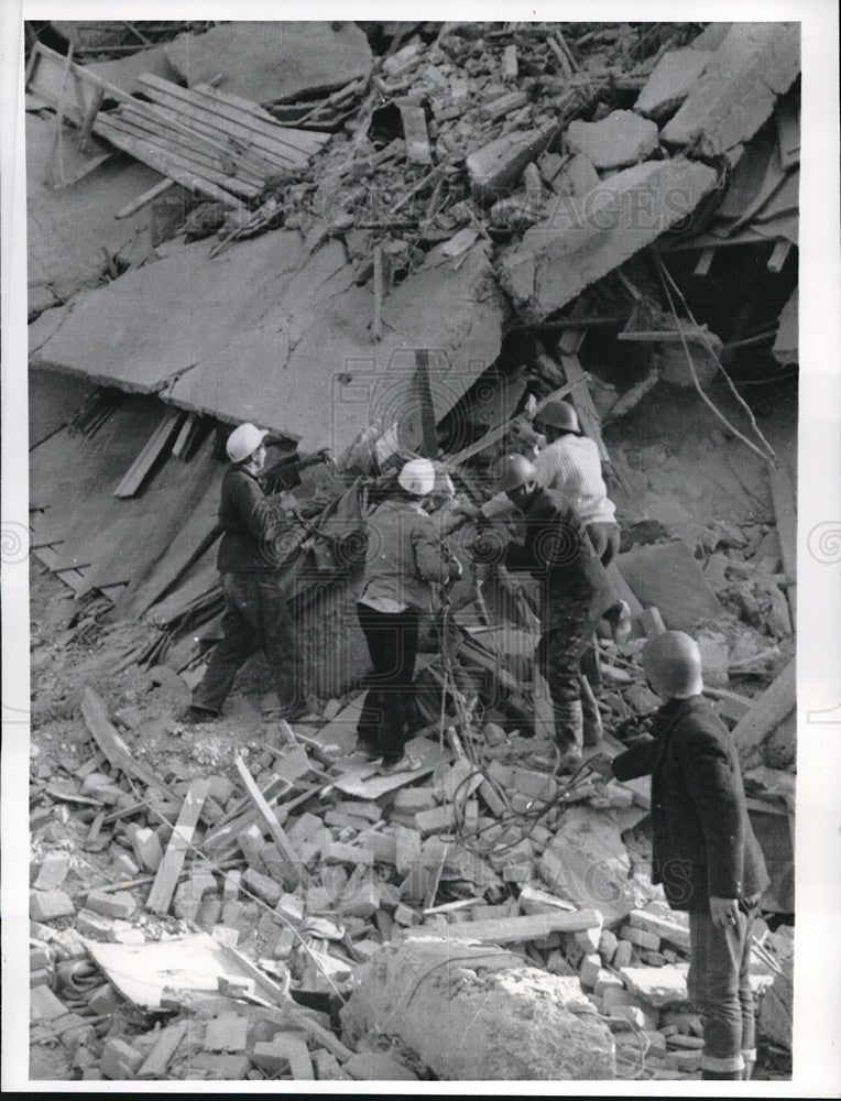 1969 Rescue workers search ruins of collapsed building in Banja Luka - Historic Images