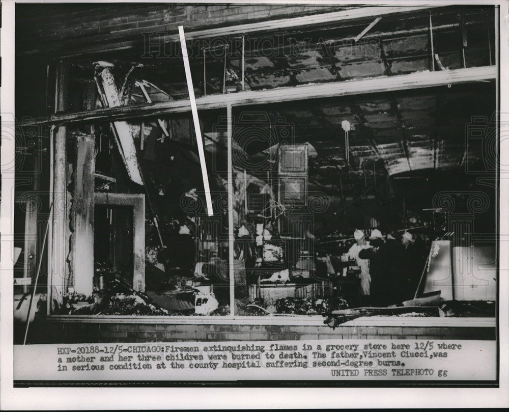 1953 Chicago firemen extinguish blaze in grocery store  - Historic Images