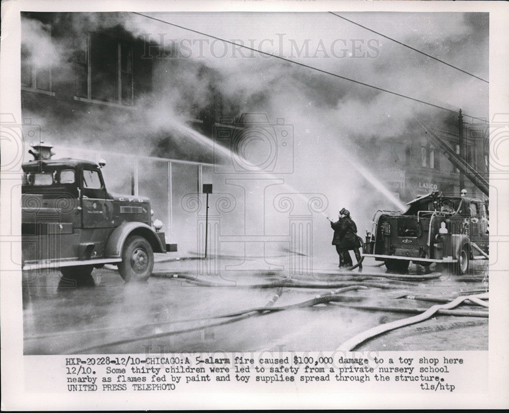 1953 Five alarm fire caused $100000 damage to toy shop  - Historic Images