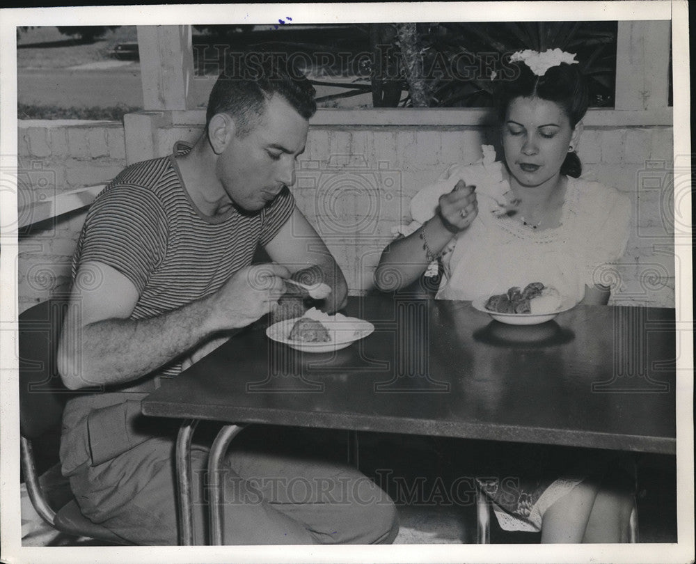 1946 Mickey Owen and his wife enjoy ice cream after Mickey quits the - Historic Images