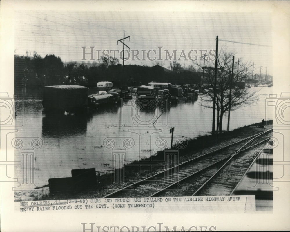 1948 Press Photo Cars and trucks stalled in flooded New Orleans - neb74615 - Historic Images