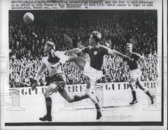 1961 Copenhagen, Sweden's Wetterlind vs  Danish player at soccer-Historic Images