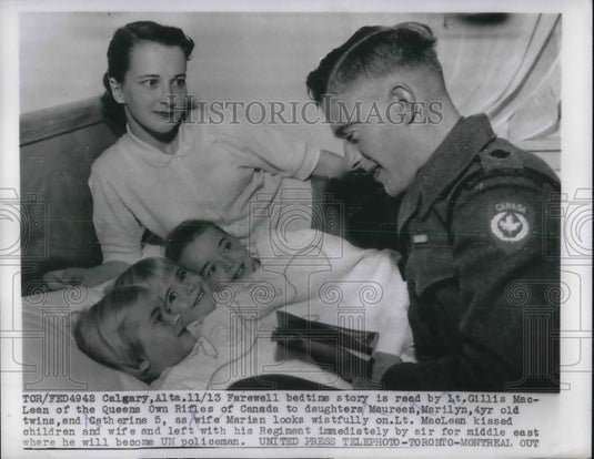 1956 Lt. Gillis MacLean Reads Children Maureen, Marilyn & Catherine - Historic Images