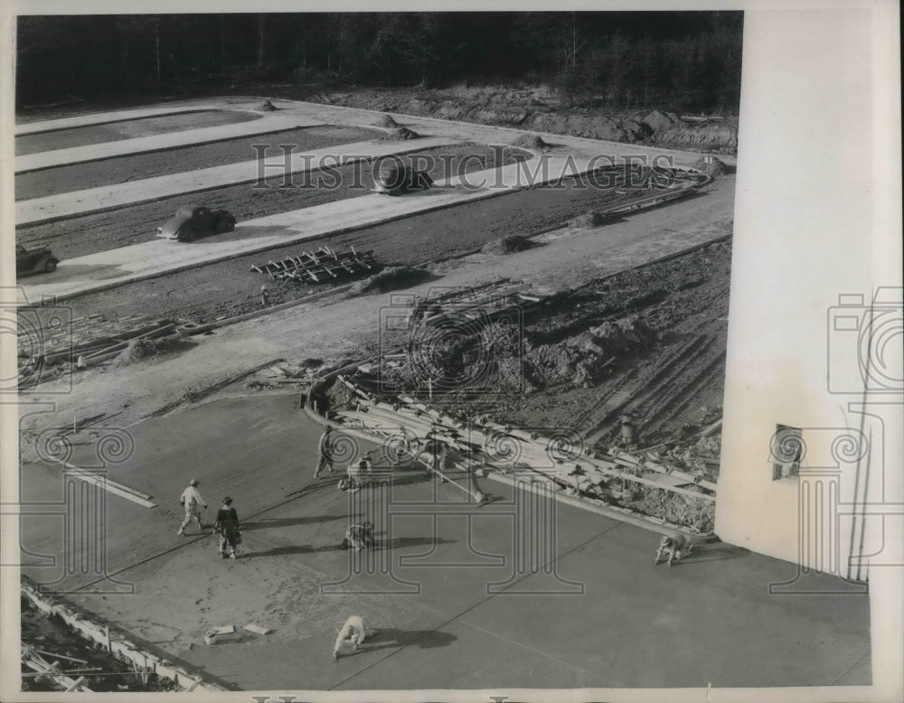 1939 Workmen surfacing one of the driveways to the grounds of the US-Historic Images