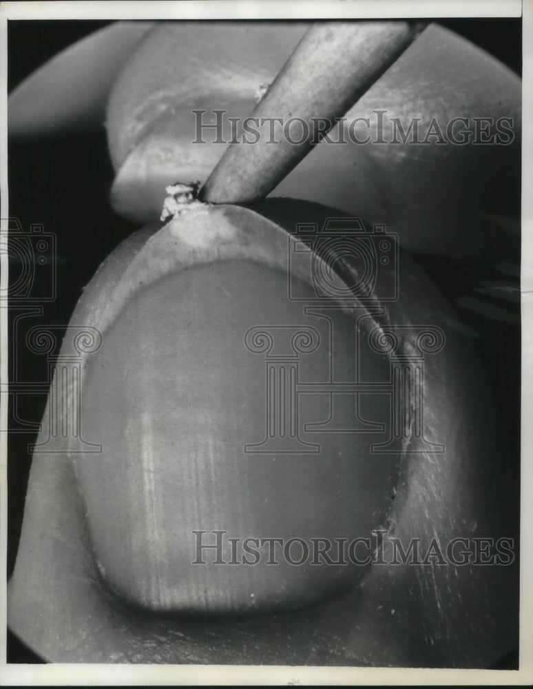 1937 Press Photo Close up of a nail that is getting manicured-Historic Images