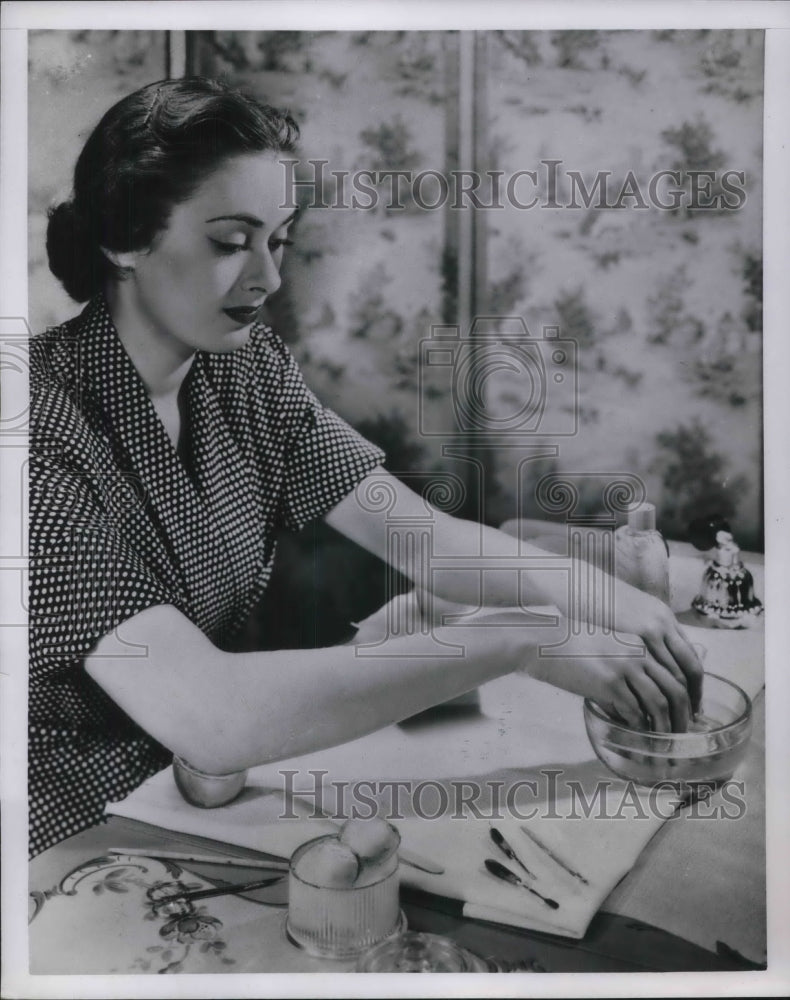 1950 Lady Soaking Her Cuticles and Nails - Historic Images