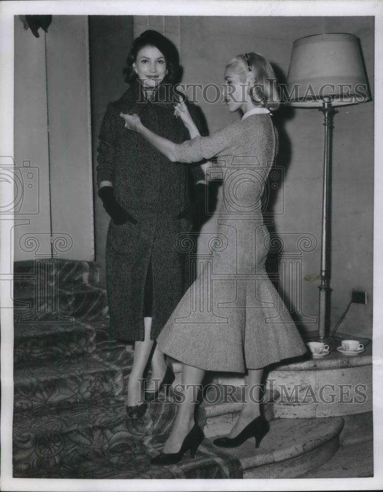 1954 designer Zita McClintock adjusts model before show, NY-Historic Images