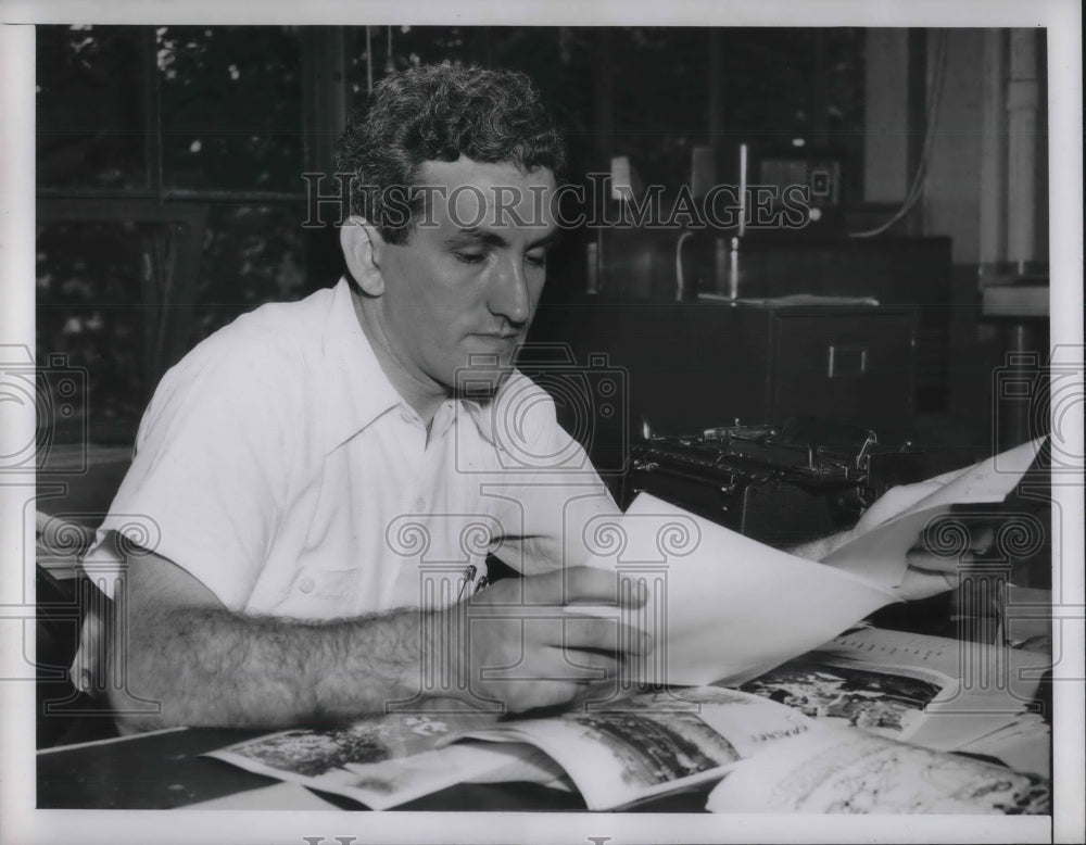 1952 George Gaylin at his desk - Historic Images