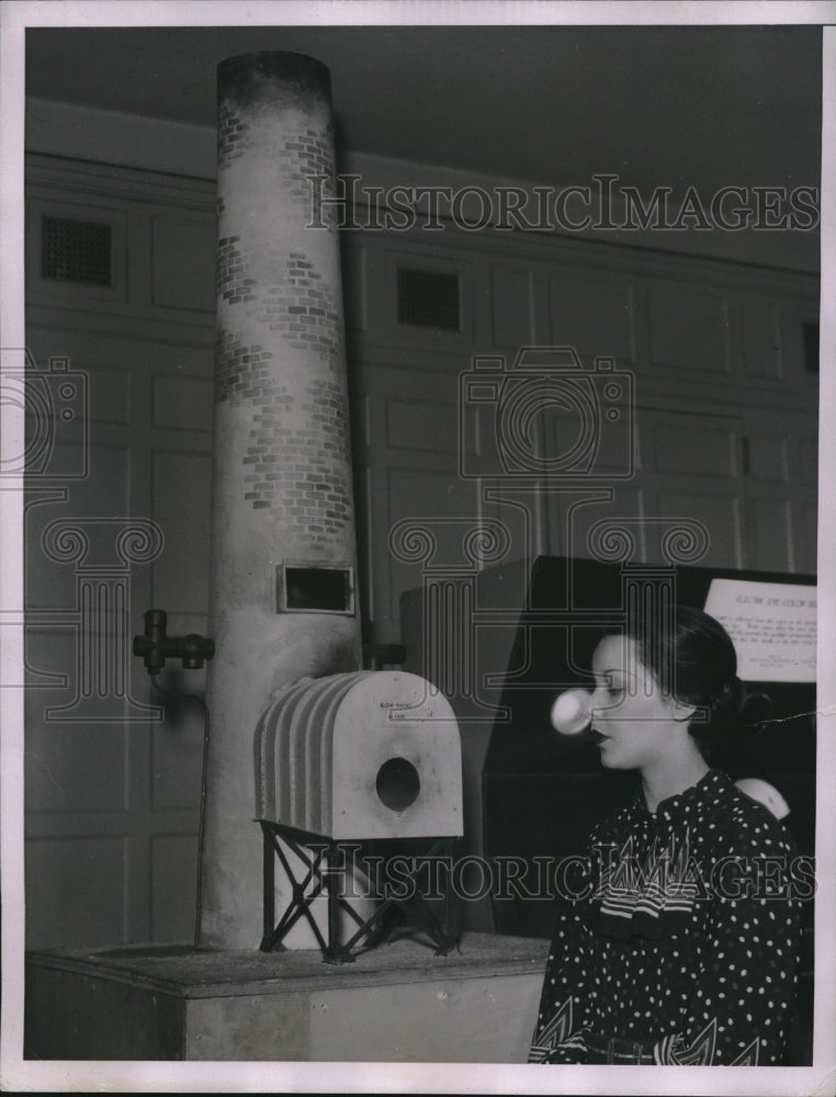 1935 Press Photo Mary Jane Donovan Looks At Model Smoke Stack - Historic Images