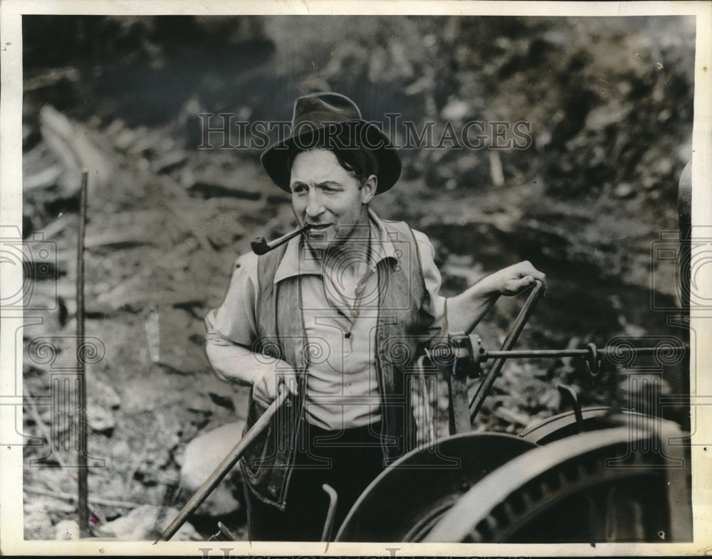 1937 Red Button laying railway steel with donkey engine in Canada-Historic Images