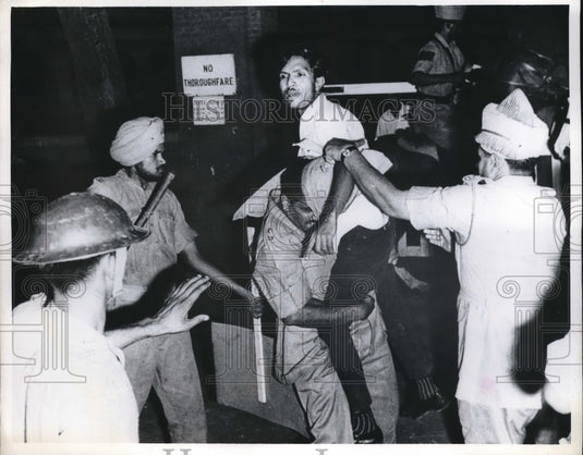 1968 New Delhi. police remove Anti - Historic Images