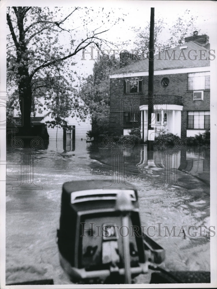 1959 Press Photo Flooded Street Using Boat with Motor Down Street - Historic Images