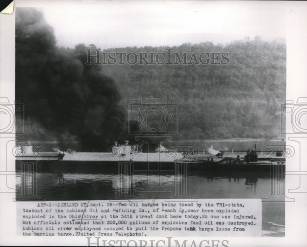 Press Photo oil barges towed by Ashland Oil Co. explode in Ohio River - Historic Images