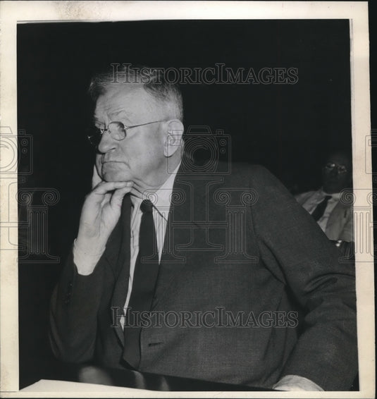 1945 Man Sitting In Chair With Suit & Tie - Historic Images