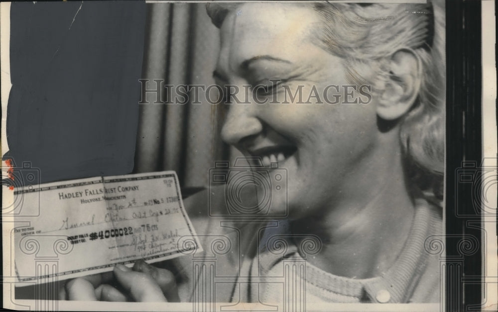 1959 Press Photo Mrs James Walsh holding a check from Hadley Falls Trust Co-Historic Images