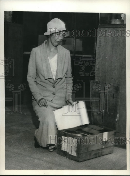 1932 Mrs Linton Satterwaite Examines Records She Saved From Fire - Historic Images