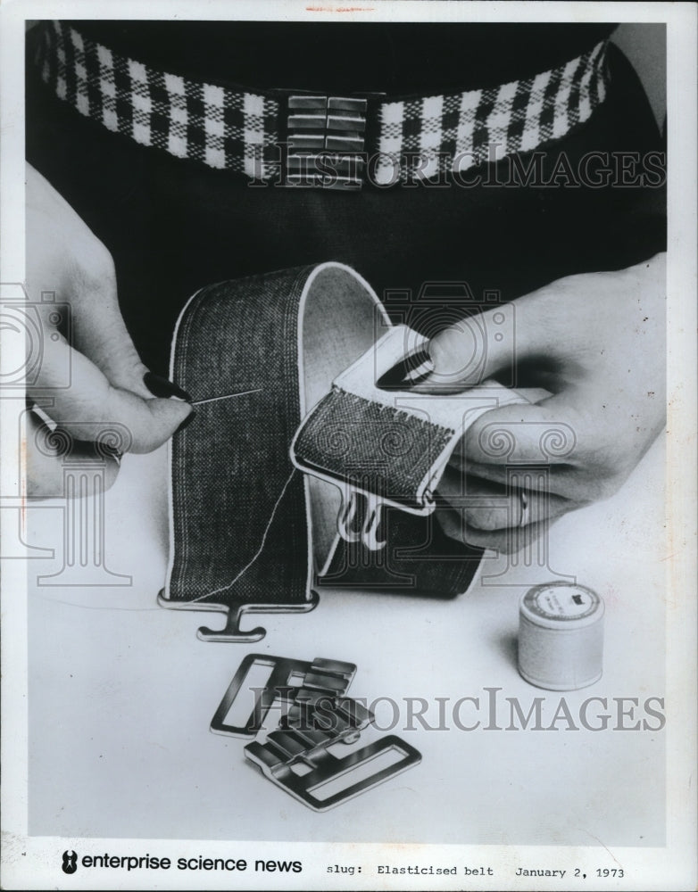 Elasticized belt being assembled &amp; sewn together - Historic Images