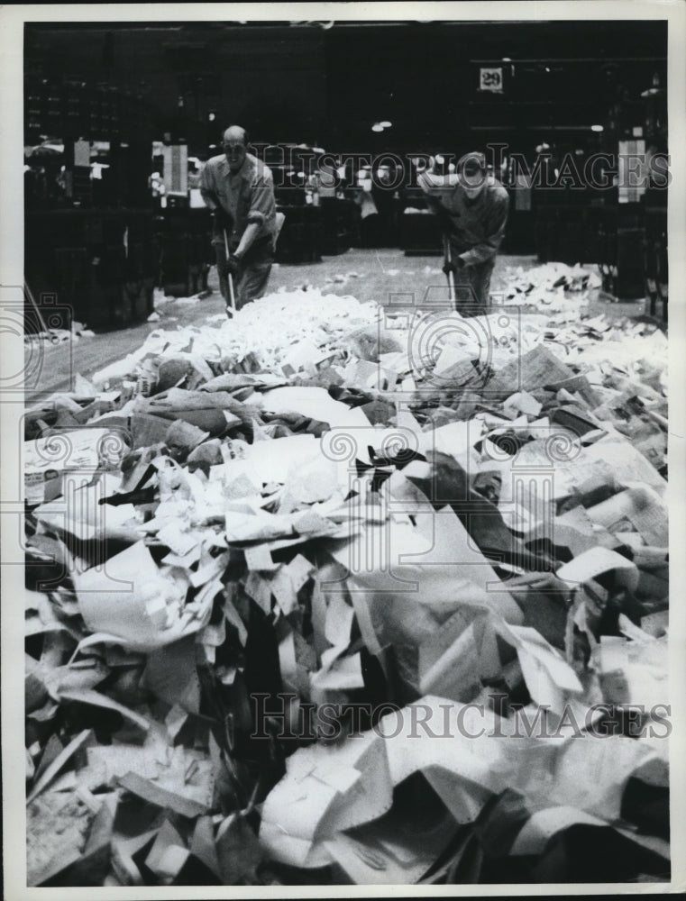 Press Photo Men Sweeping up Scrap paper - Historic Images