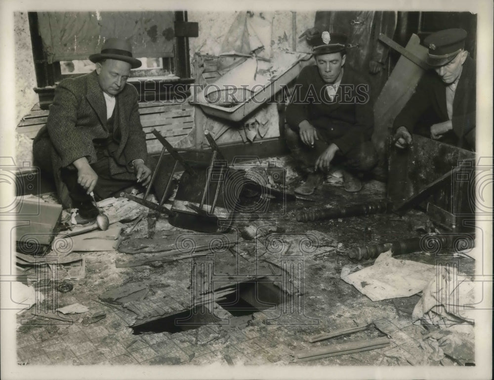 1930 Press Photo Firemen examining wreckage where a bomb exploded - Historic Images