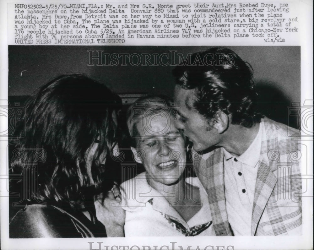 1970 Convair 880 hijack victim Mrs. Roebed Duwe reunited with family - Historic Images