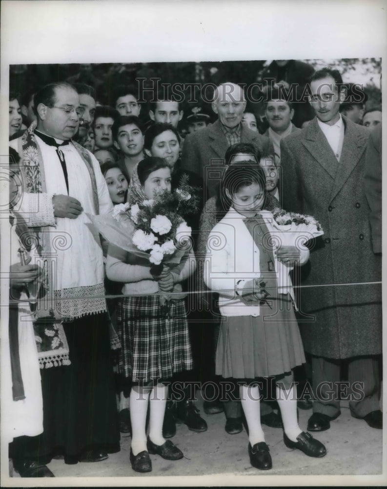 1958 Marisa Cuts Ribbon with Father Pietro Mambrini Prirst of Nivvia - Historic Images