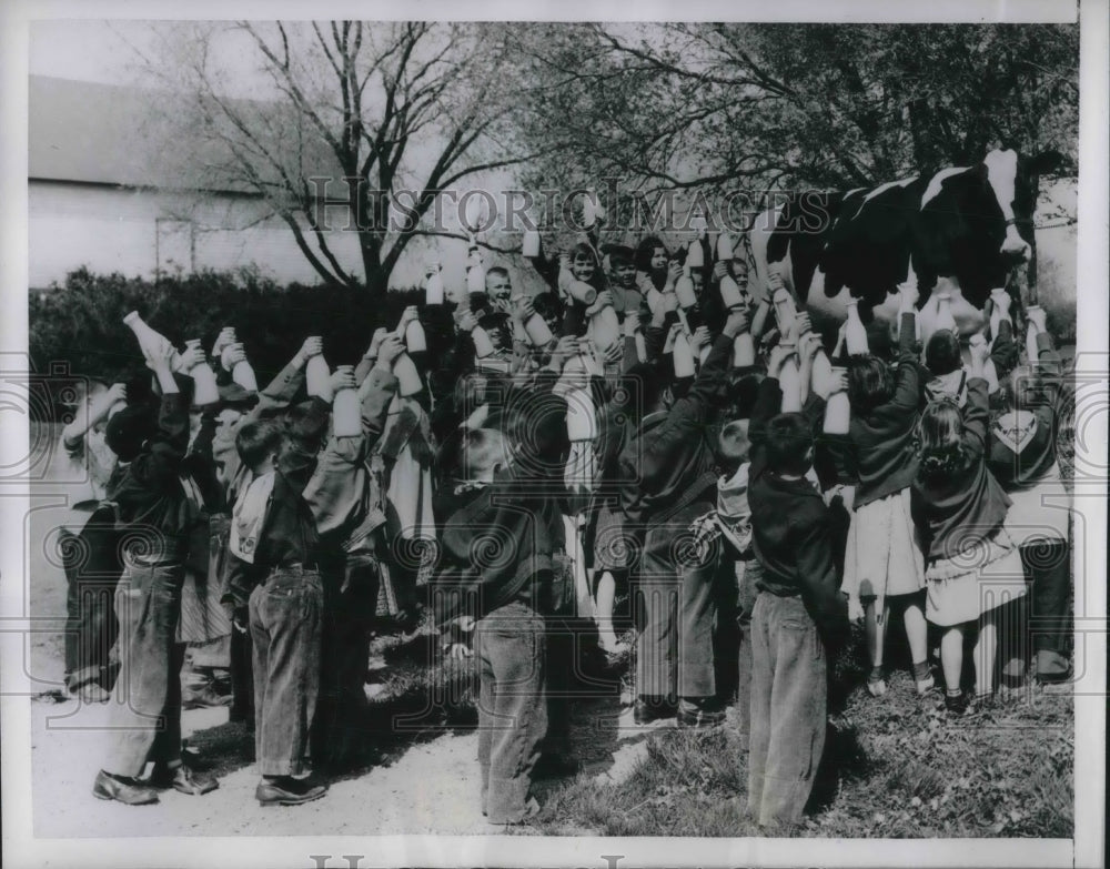 1954 A milk toast for the Mooseheart Princess Star. - Historic Images