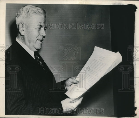 1948 Press Photo Government official Michael J. McDermott reading paper-Historic Images